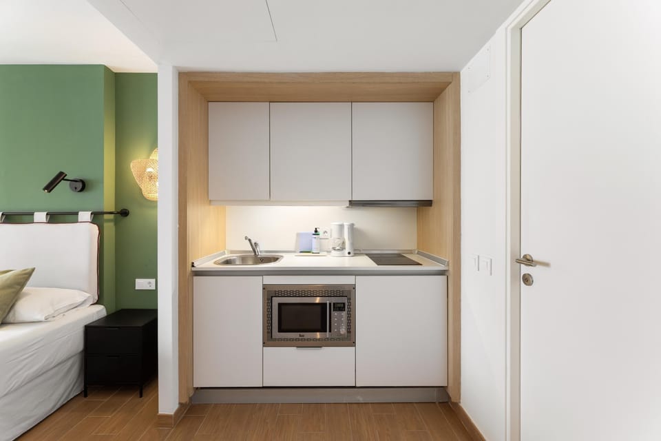 Junior Suite, Ocean View (3 adults and 1 child) | Private kitchen | Mini-fridge, electric kettle