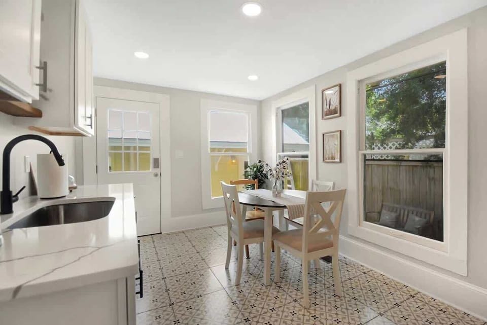 Another angle of the kitchen showing tons of natural light.