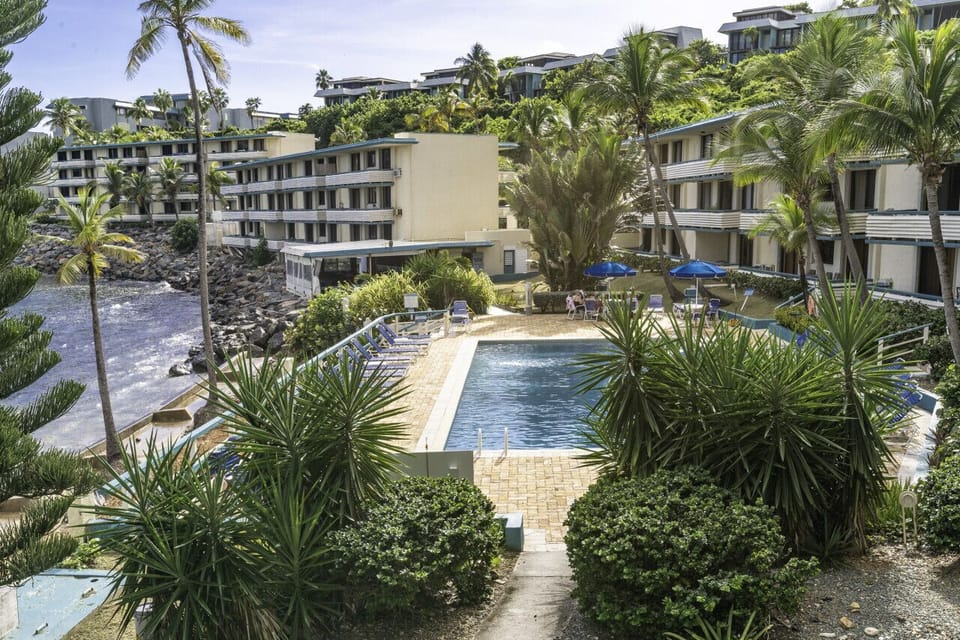 The large ocean-side pool as seen from the balcony , with MIm`s Seaside Bistro in the background!