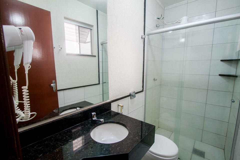 Shower, towels, soap, toilet paper
