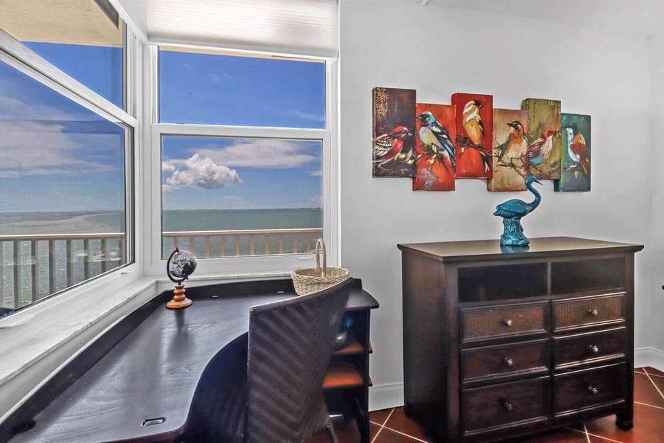 A corner work desk is a great spot to keep up with work back home, if needed; unlimited, free WiFi is provided.