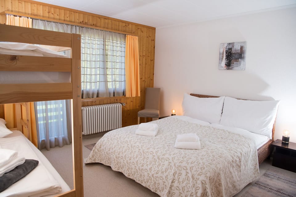 Sleepingroom with one Doublebed and one bunkbed
