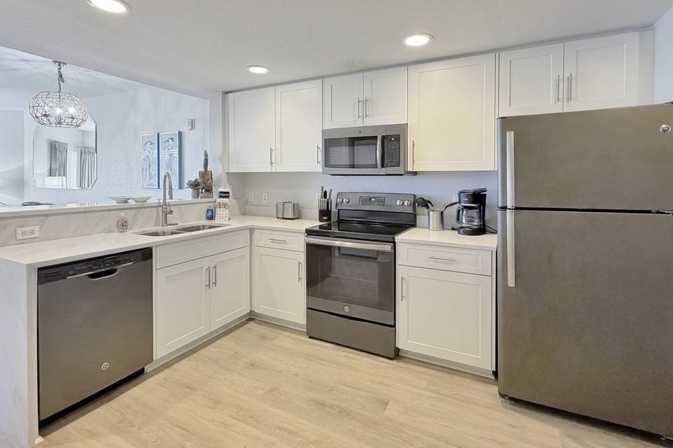 ully Equipped Kitchen with Granite Countertops, All Needed Small Appliances, and Beach Views