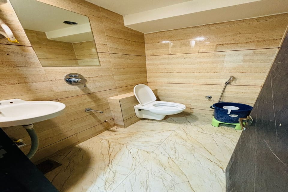 Deluxe Double Room, City View | Bathroom | Shower, free toiletries, towels, soap