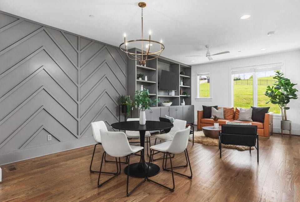 Share a meal at the dining table with seating for five.