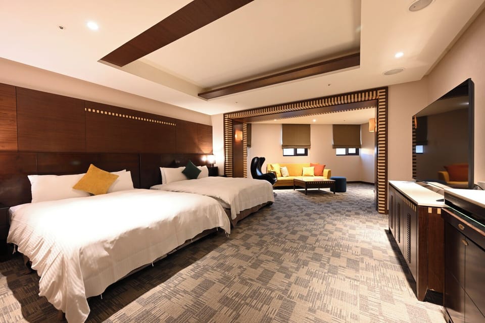 Executive Quadruple Room | Down comforters, desk, laptop workspace, blackout drapes