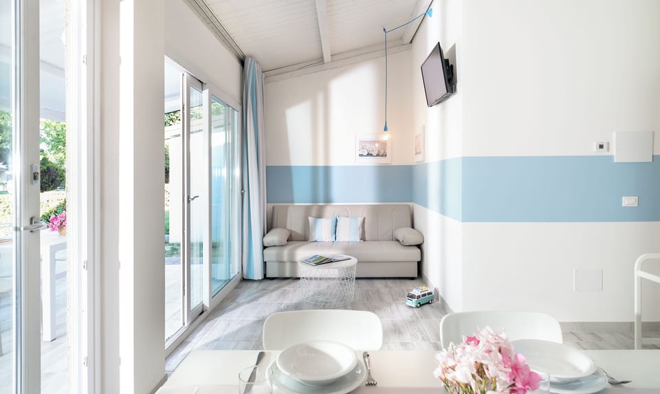 Comfort Condo, Pets Allowed | Living area | 28-inch TV with digital channels