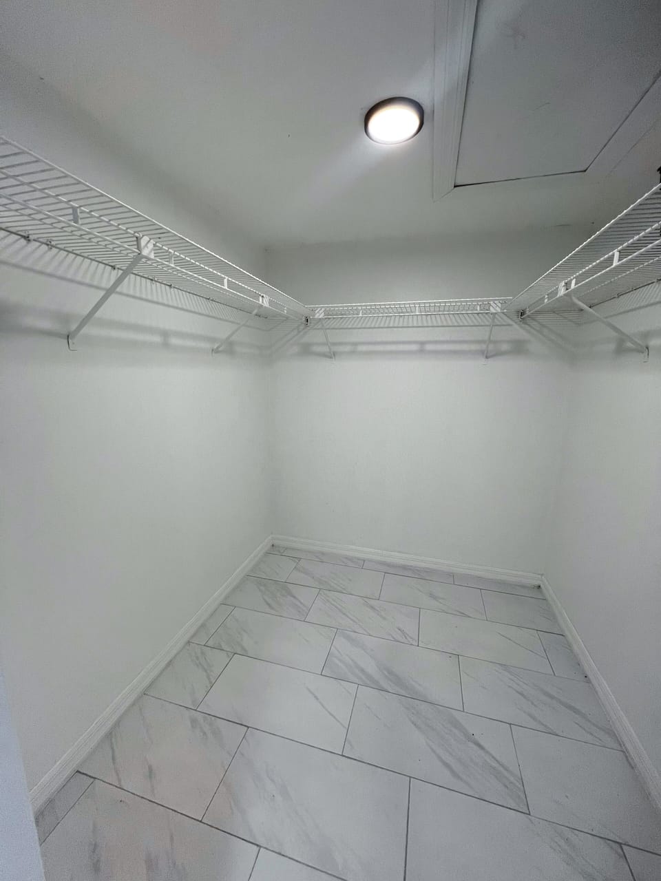 Master bedroom walk in closet. - Master bedroom walk in closet.
