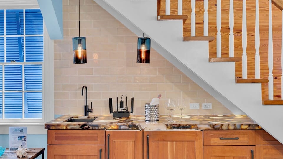 There's a wet bar under the stairs, equipped with an ice maker...