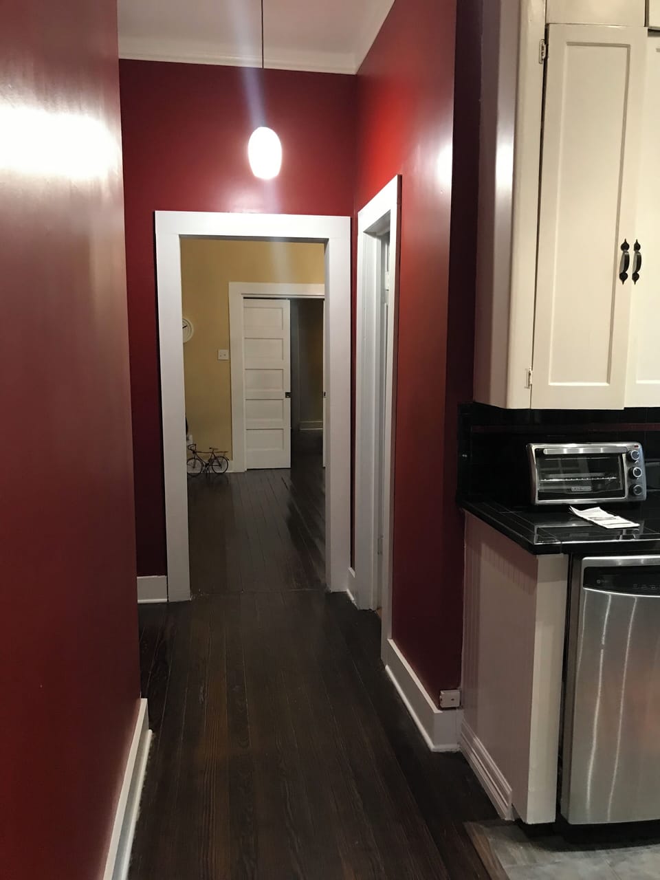 View of the dining room and beyond from the kitchen