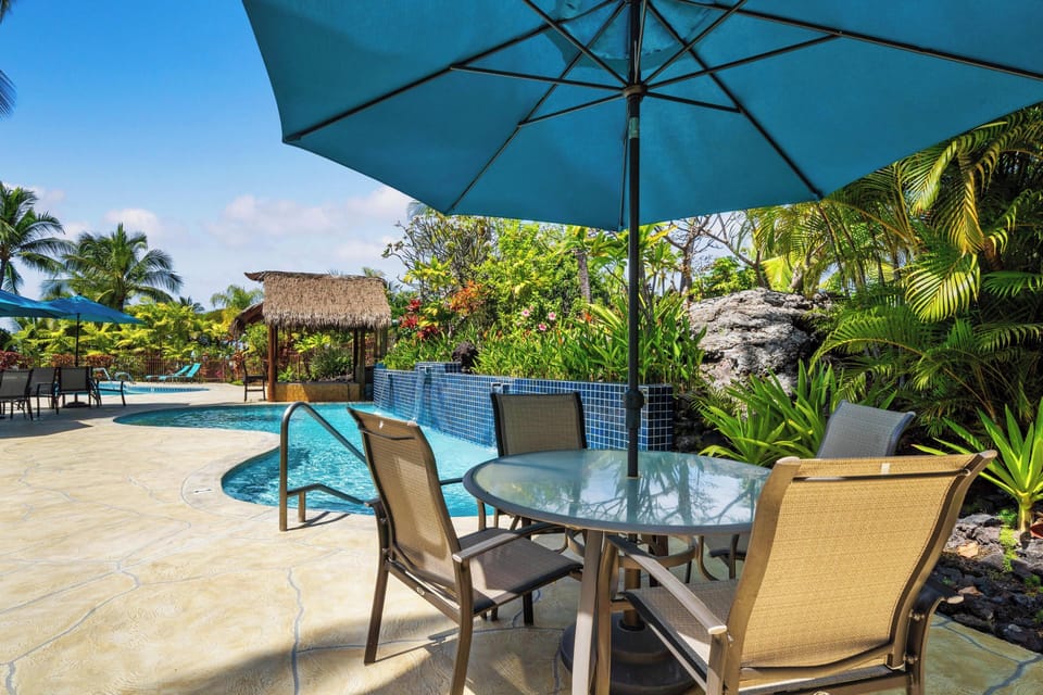 Pool area with umbrellas and seating