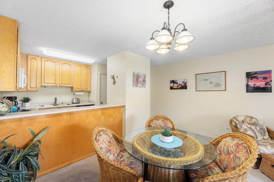 Enjoy meals together in this inviting dining area, featuring comfortable seating and an open layout that connects seamlessly to the kitchen for easy entertaining and everyday convenience.