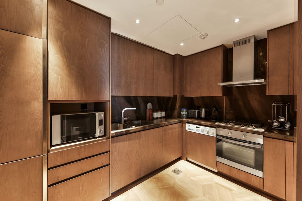 Deluxe Apartment, 1 Bedroom | Private kitchen | Fridge, microwave, oven, dishwasher