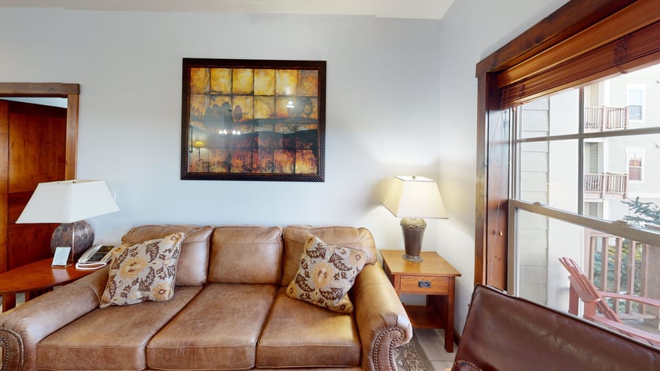 Furniture, Indoors, Living Room, Couch, Lamp