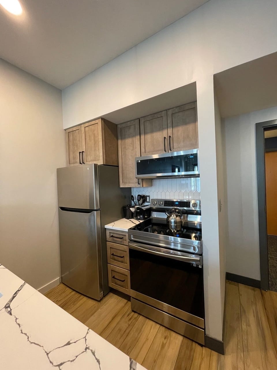 Indoors, Refrigerator, Kitchen, Floor, Microwave