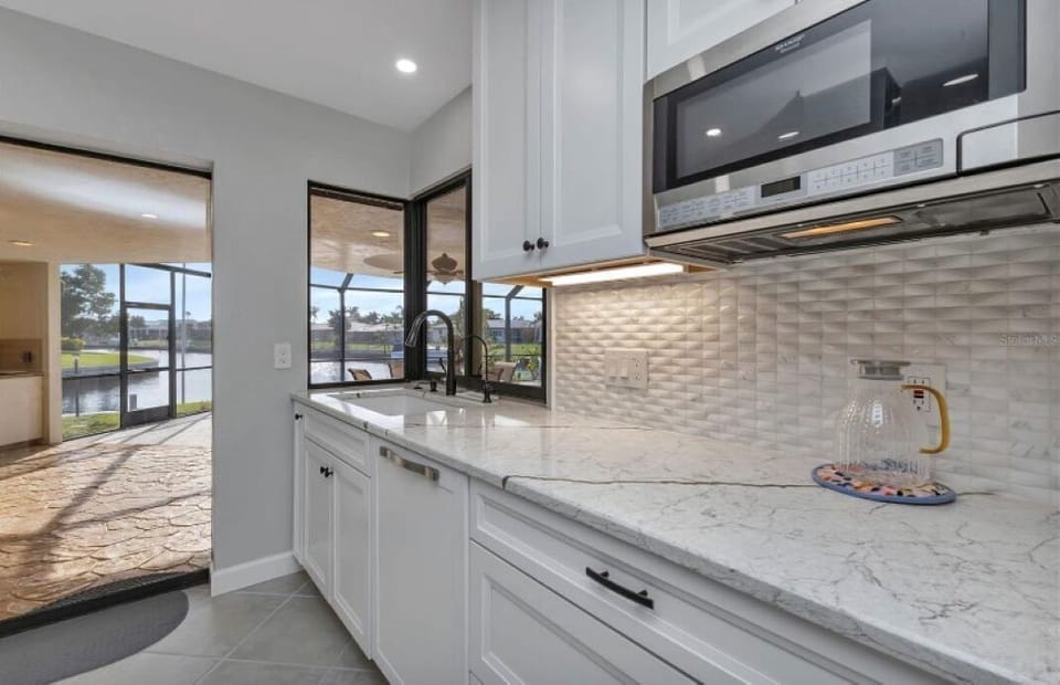 EXPANSIVE DREAM KITCHEN WITH CUSTOM GRANITE COUNTERTOPS