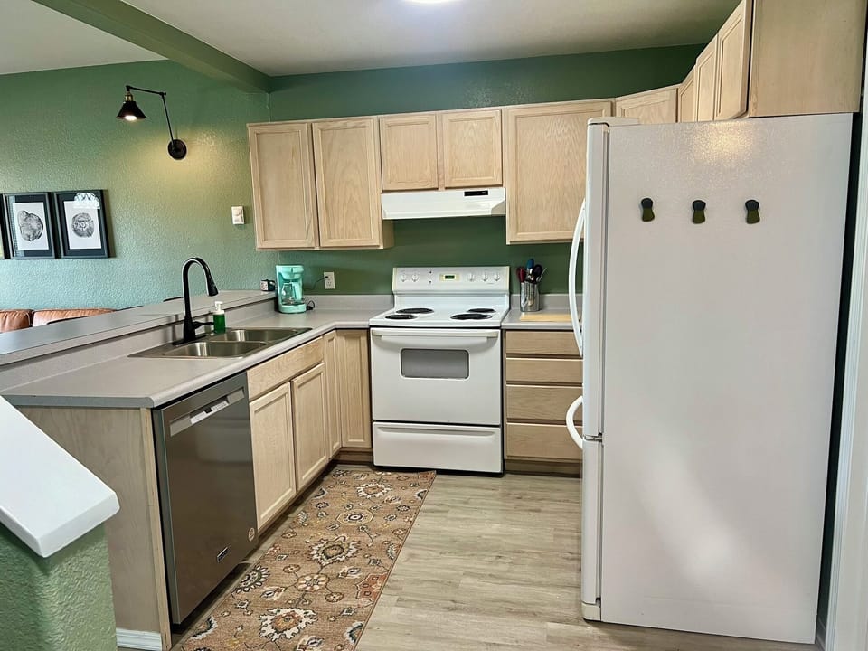 Well appointed kitchen with all the basics for cooking.