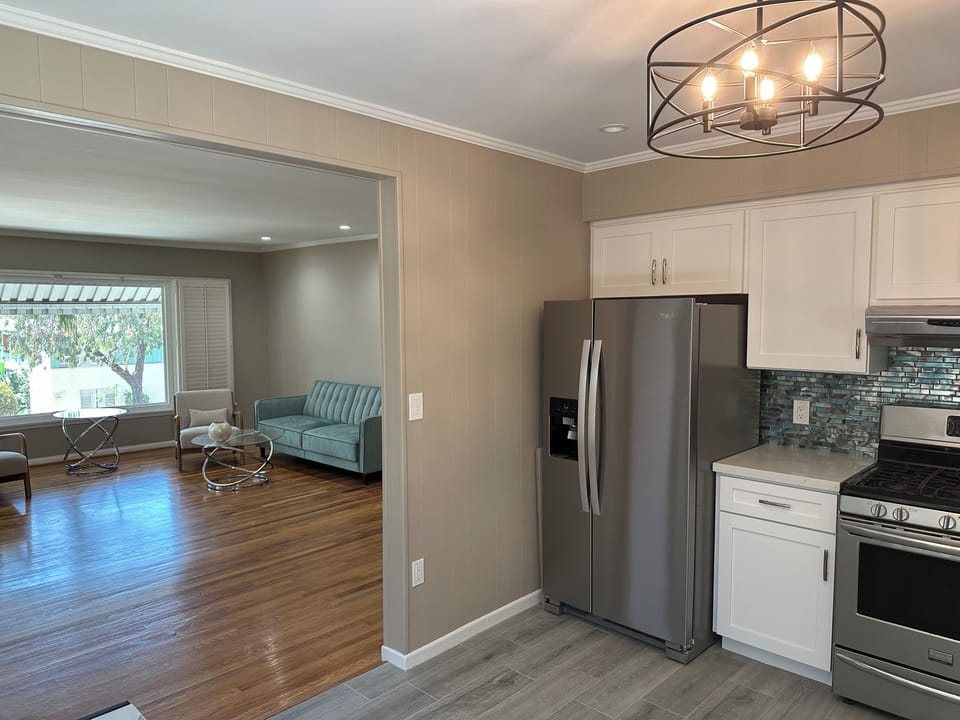 Kitchen connects to living room
