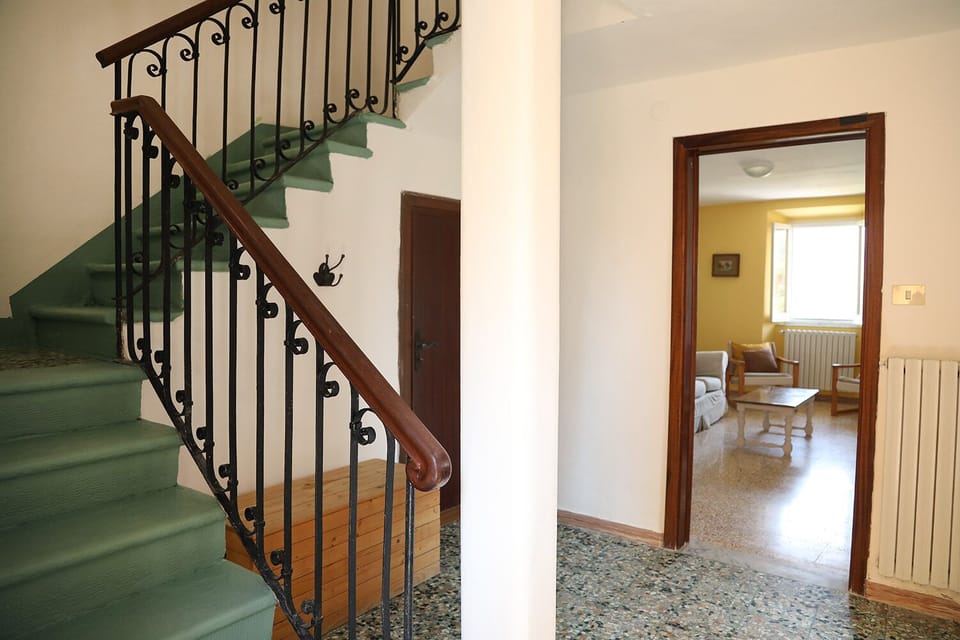 Living room and staircase.