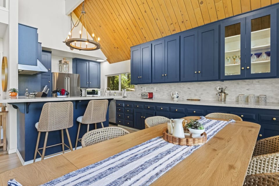 Spacious kitchen island w/ bar seating invites casual breakfasts & conversation