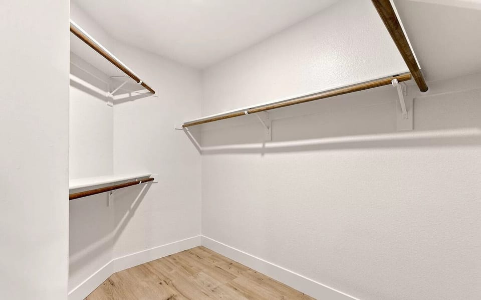 Walk in closet for bedroom 2. 
Bedroom 1 has a similar walk-in closet