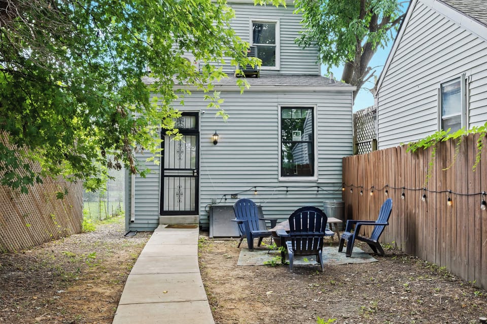Backyard: Gather around for drinks, dining, or just relaxing in this inviting backyard retreat.
