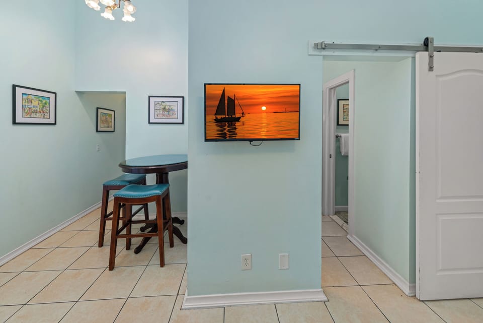 Dining area/Door to 1st full bathroom & bedroom