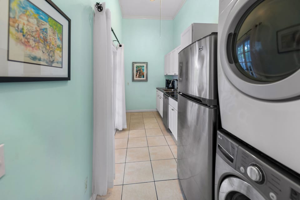 Full kitchen with washer and dryer