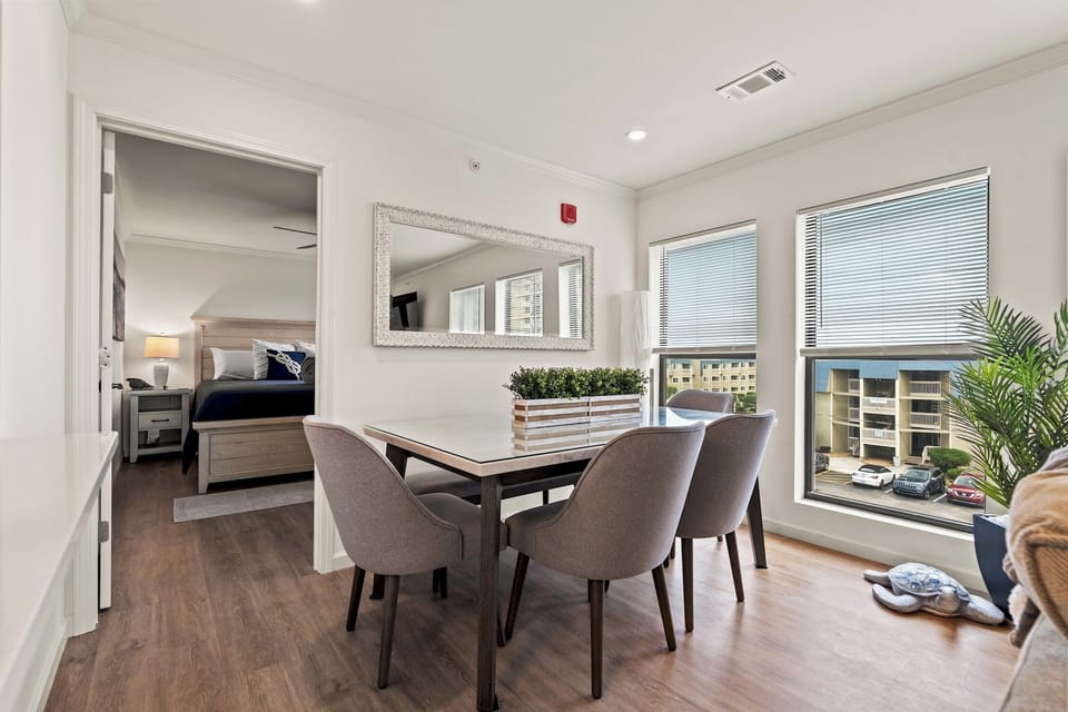 This bright and sunny room allows everyone to enjoy a meal together.