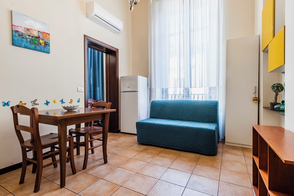 Apartment | Living area | 30-inch flat-screen TV with digital channels