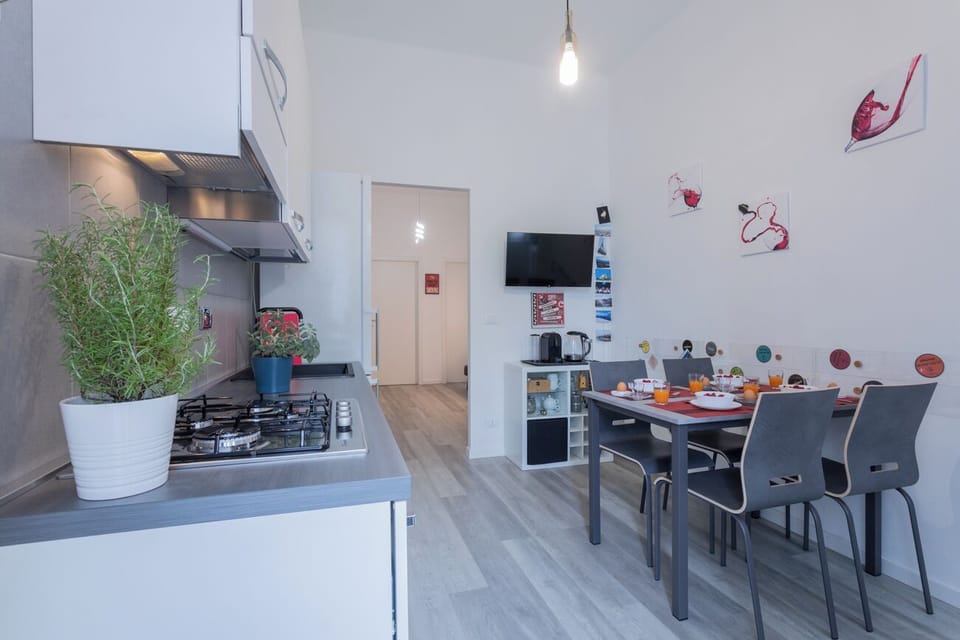 Apartment, Balcony, City View | Living area | 35-inch TV with digital channels