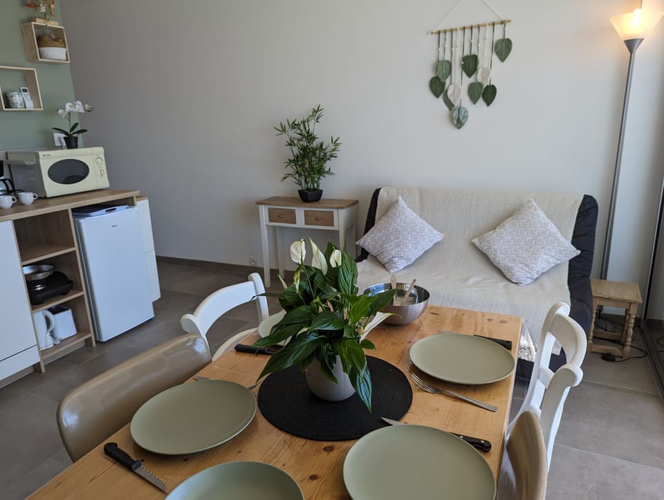 Pleasant living room with lounge and dining area