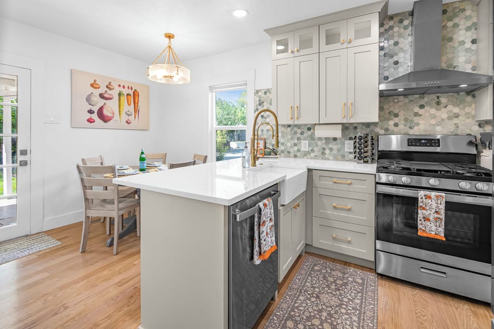 Kitchen with all new stainless appliances, quartz countertops, farmhouse sink