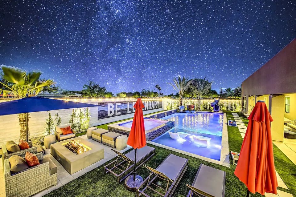 Pool with 4 lounge chairs, 2 lounge chairs in the tanning ledge. Fire pit and spa that fits your whole group!