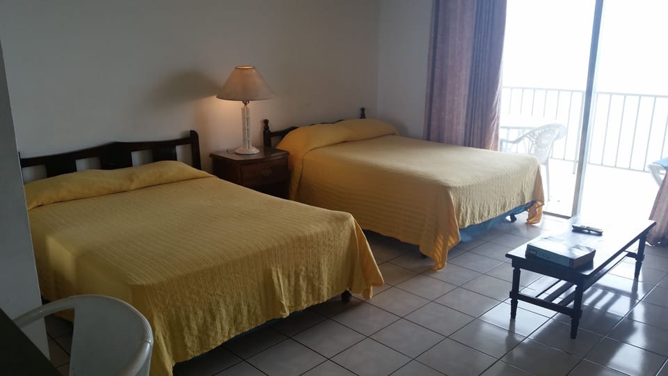 Basic Apartment, Ocean View, Beachside | Iron/ironing board, WiFi (surcharge), bed sheets