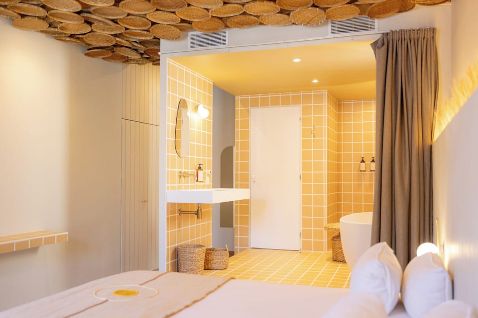 Deluxe Room, Balcony, City View | Minibar, in-room safe, individually decorated, individually furnished
