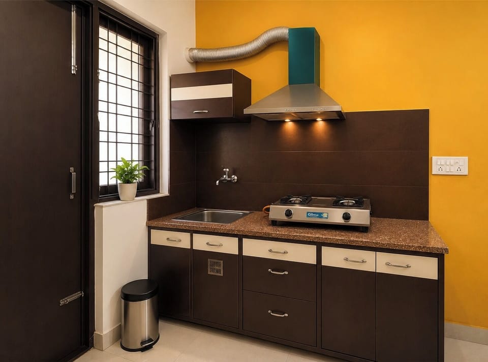 Deluxe Apartment | Private kitchen | Fridge, stovetop, dining table