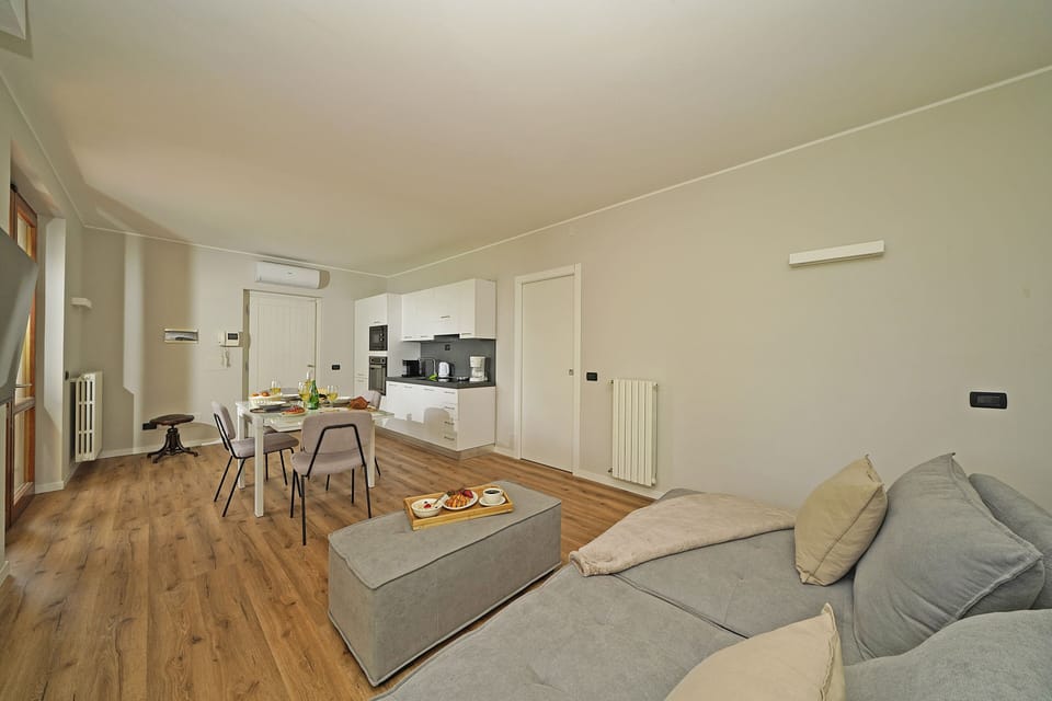 Apartment, Garden View | Living area | 35-inch TV with digital channels