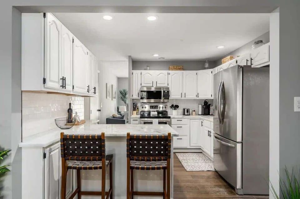 Lovely kitchen with bar stools and kitchen island great enjoying with family and friends