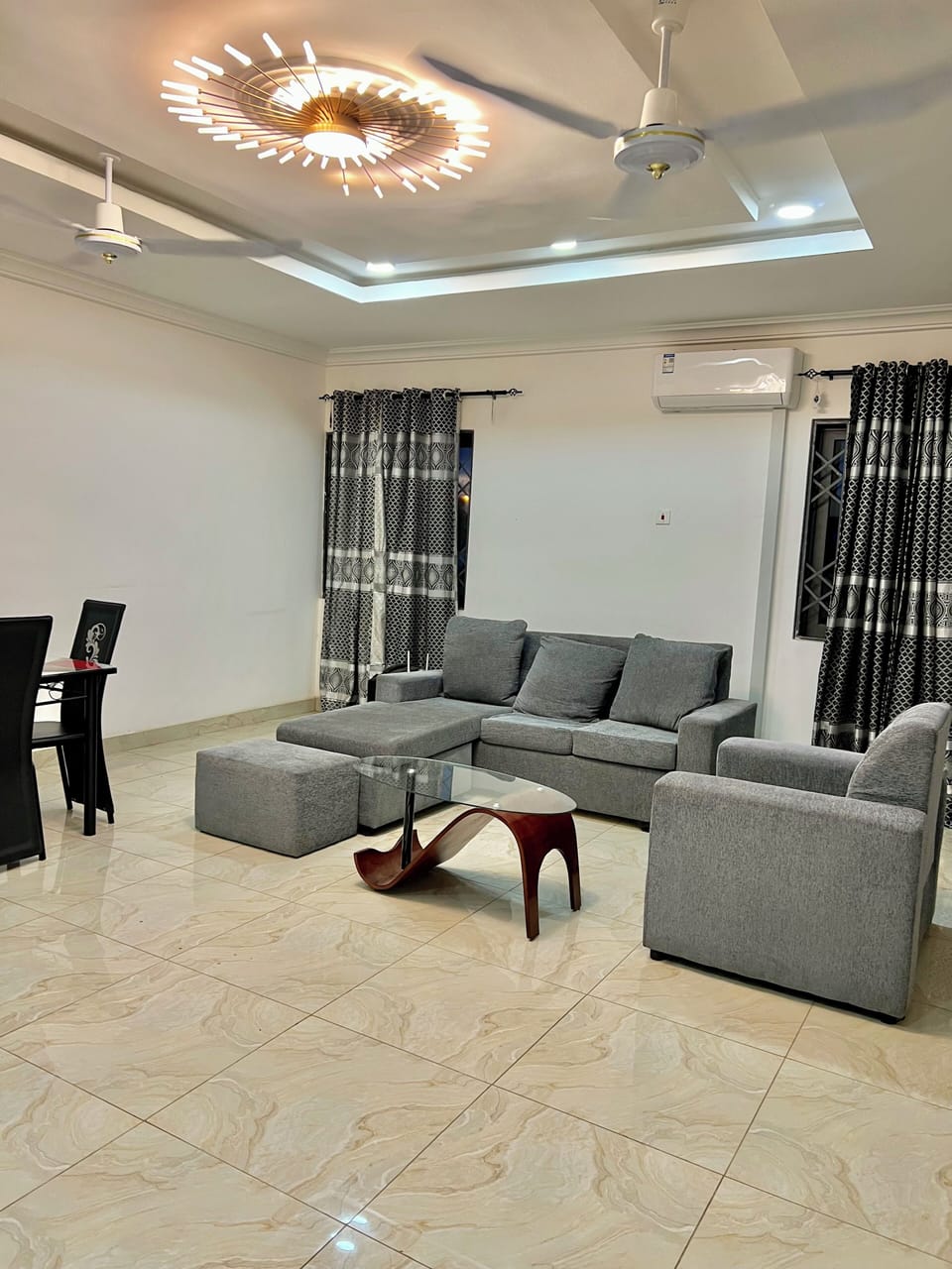 Deluxe Apartment, 2 Bedrooms | Living area | 50-inch LCD TV with digital channels, streaming services