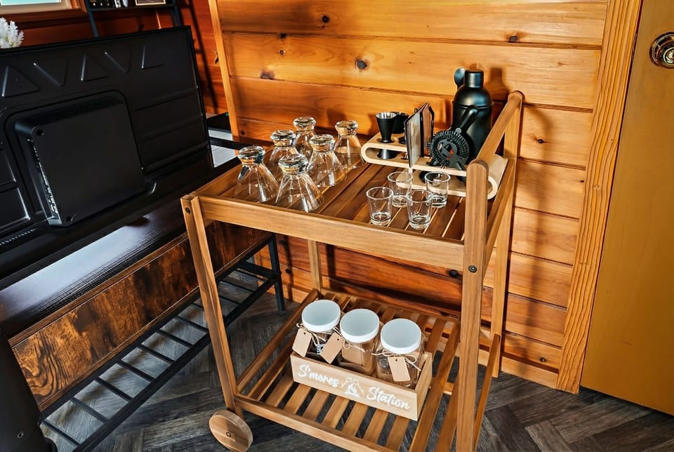 Bar cart with everything needed to mix your own drinks (minus the alcohol), and S'mores Station