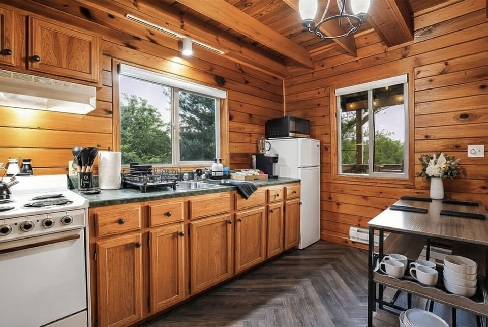 Fully stocked kitchen (oven is smaller than regular size) with assorted K-Cups, Tea Bags, and Welcome Snacks