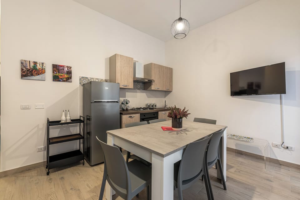 Apartment, City View | Private kitchen | Fridge, oven, stovetop, coffee/tea maker