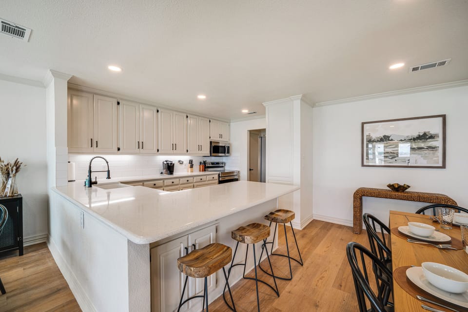 Kitchen | Stainless Steel Appliances w/ Dishwasher | Breakfast Bar
