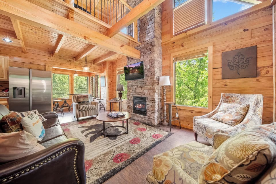 Bright and spacious living area with a fireplace and room for everyone.