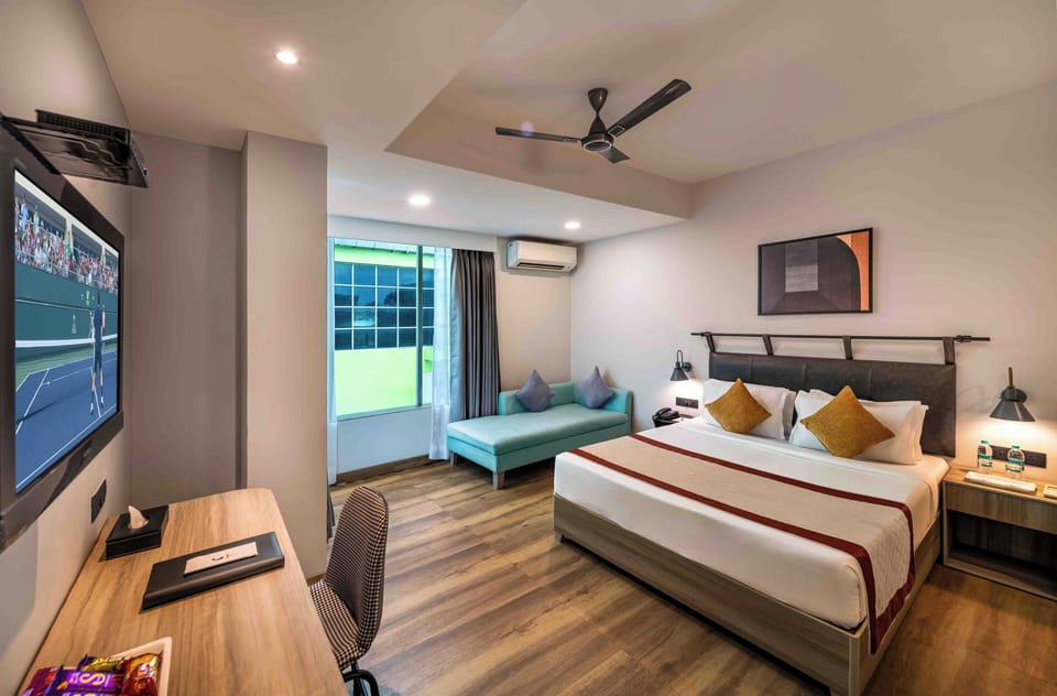 Comfort Suite, City View | In-room safe, desk, laptop workspace, iron/ironing board