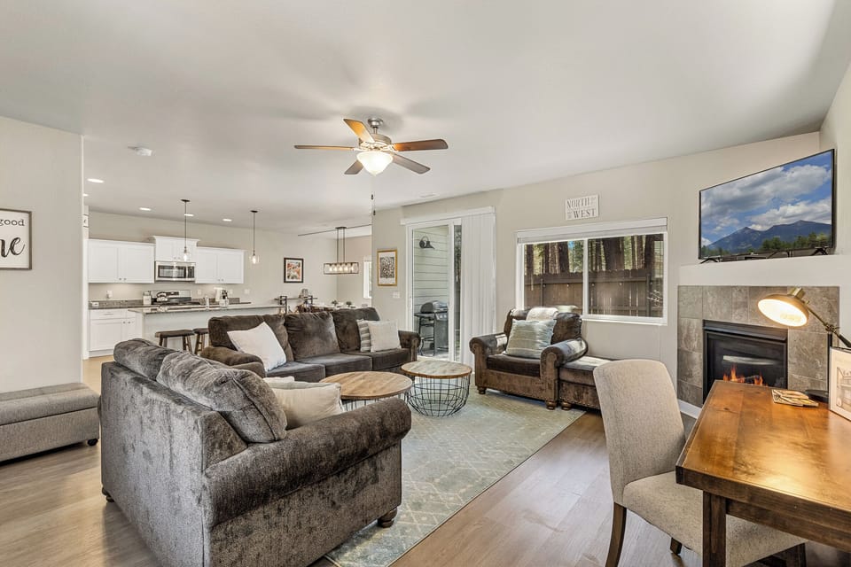 Open concept living, kitchen, and dining area makes gathering easy