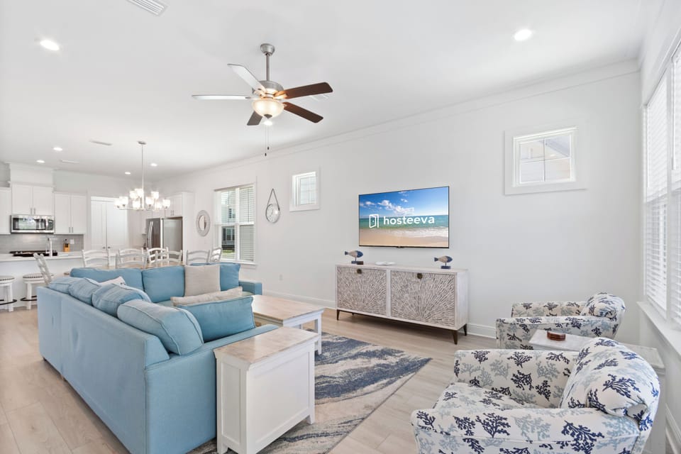 Signature House, 4 Bedrooms, Balcony, Bay View | Living room | 75-inch Smart TV with digital channels