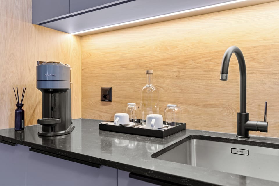Junior Suite | Private kitchenette | Espresso maker, electric kettle, highchair