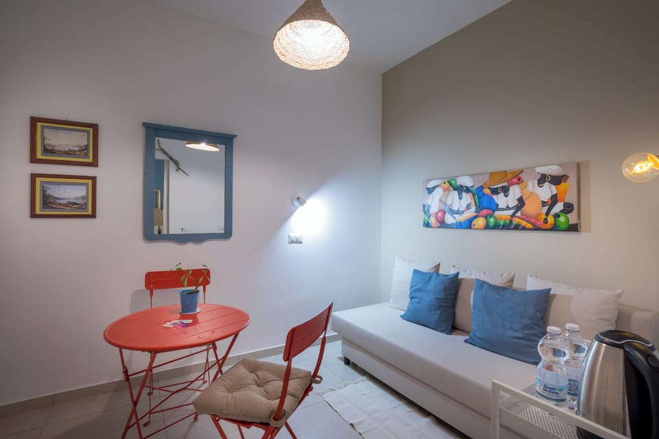 Family Suite | Down comforters, in-room safe, blackout drapes, iron/ironing board